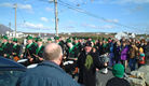Band marching with Shamrock man - 52KB