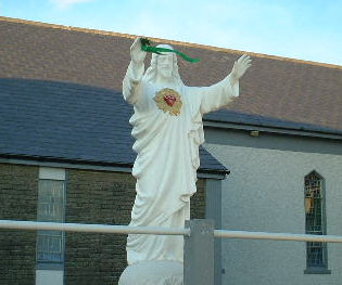 Statue of Jesus wearing shamrock